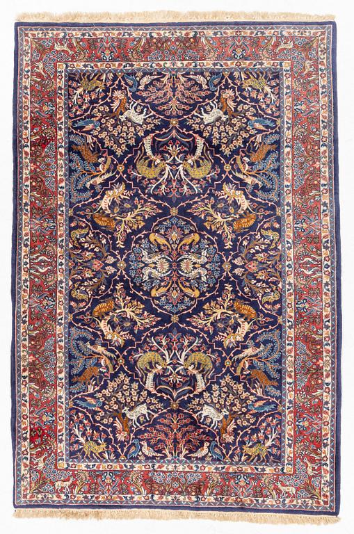 Rug, likely Tabriz, signed, approximately 212 x 145 cm.