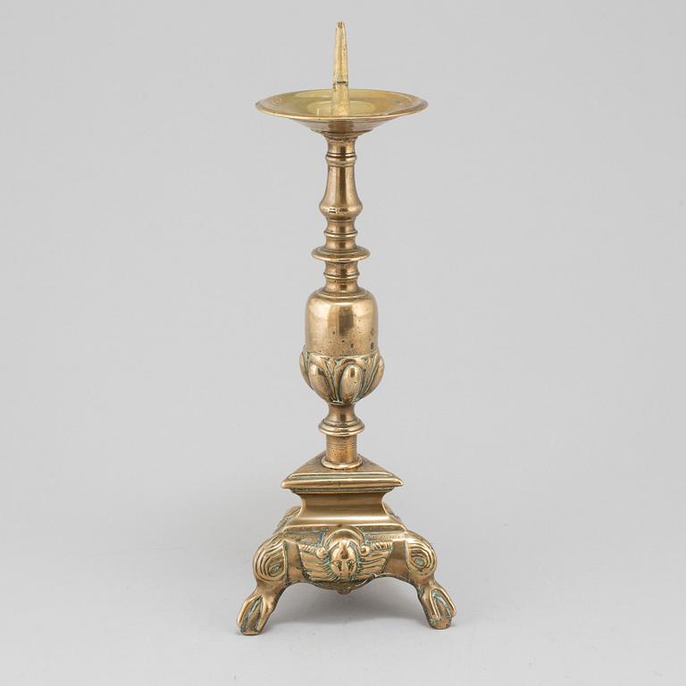 A 17th century bronze candlestick.