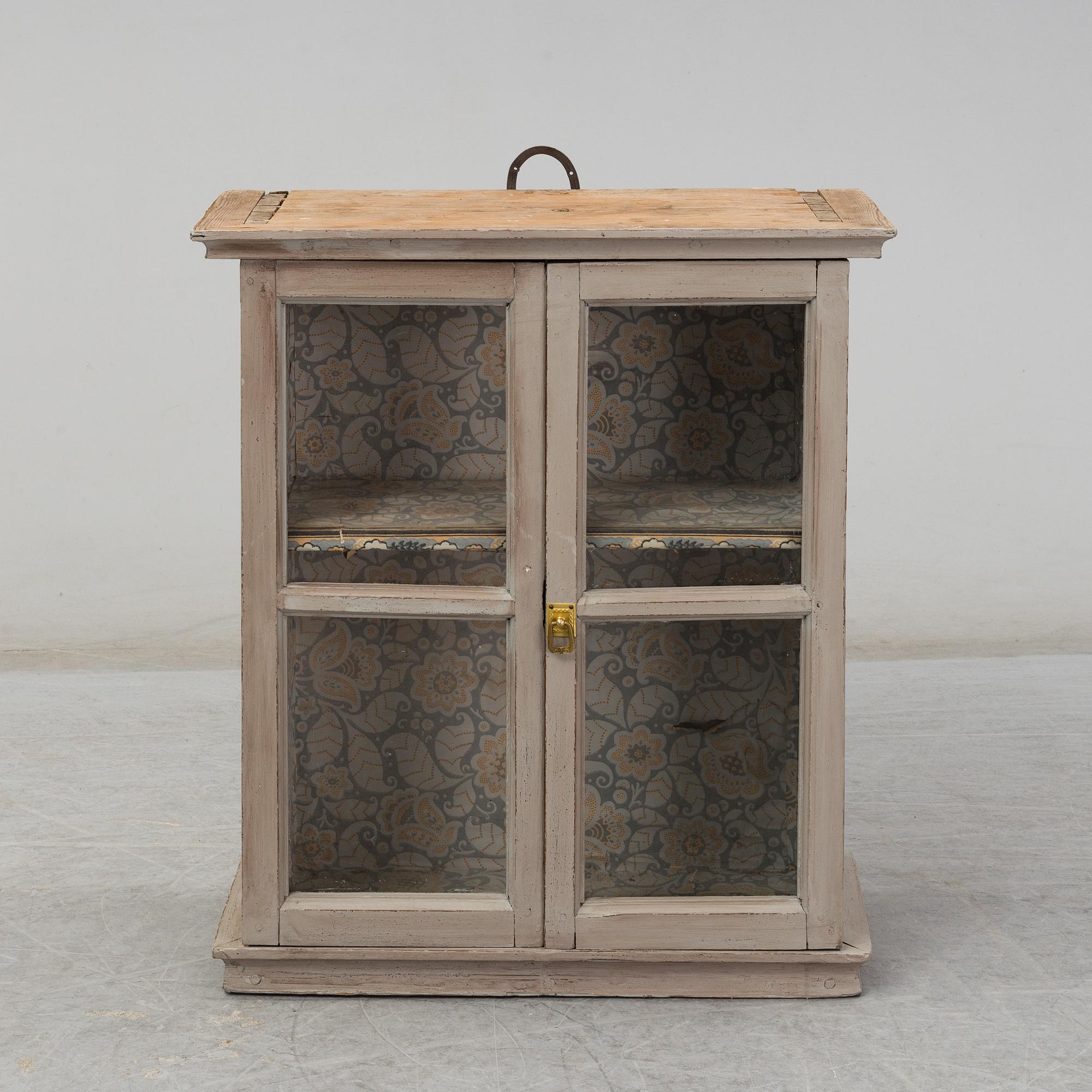 a wall-cabinet from the 19th century.