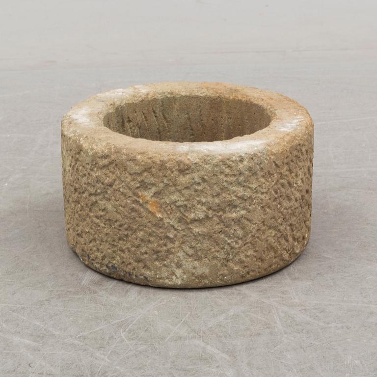 A 20th century stone flower pot.