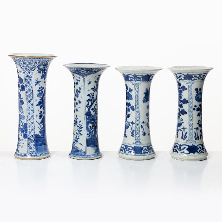 Four blue and white trumpet vases, Qing dynasty, Kangxi (1662-1722).