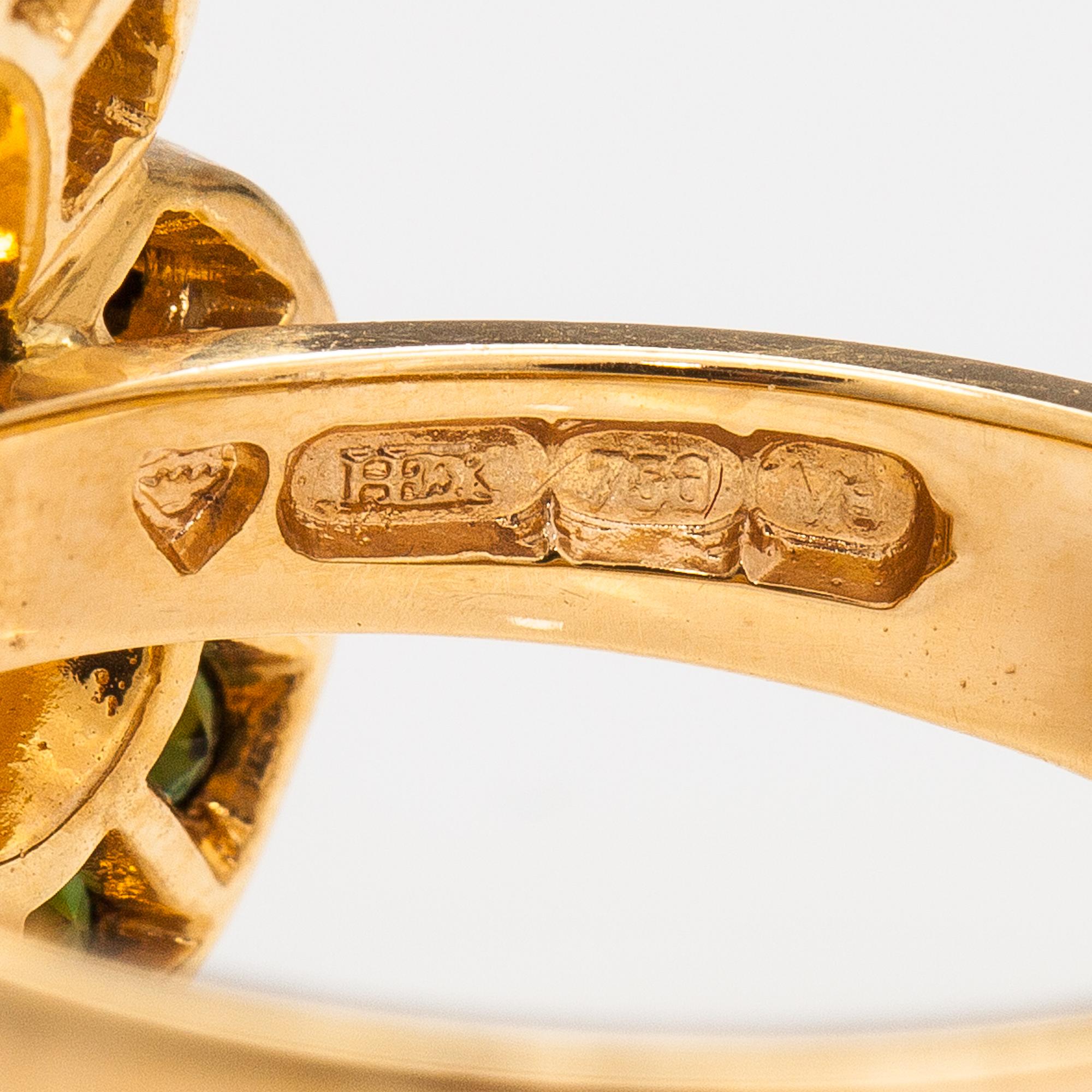 An 18K gold ring "Karin Månsdotter", tourmalines and diamonds ca. 0.26 ct in total. Ofelia Jewelry, Helsinki 1998.