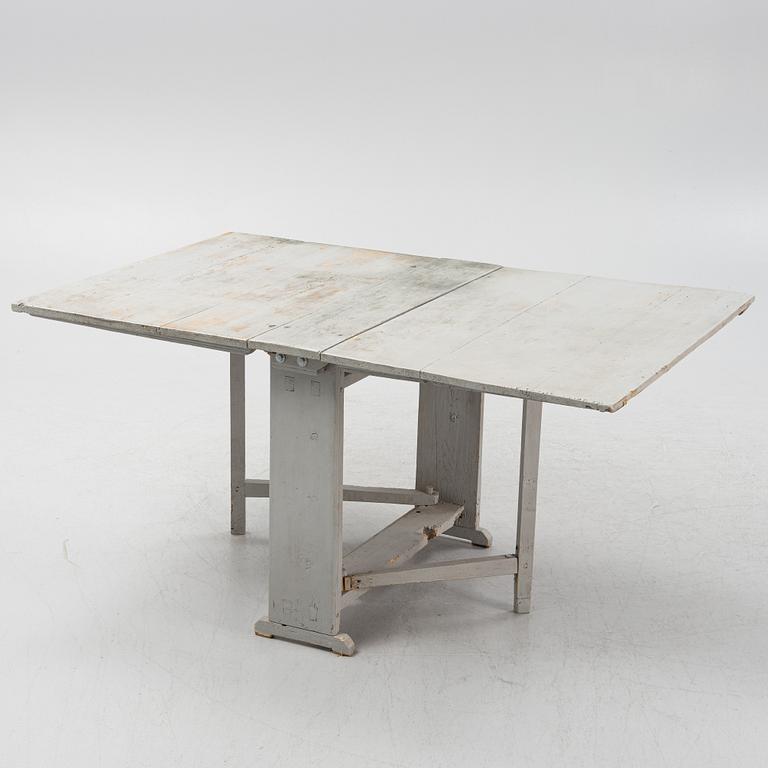 A 19th century gate-leg table.