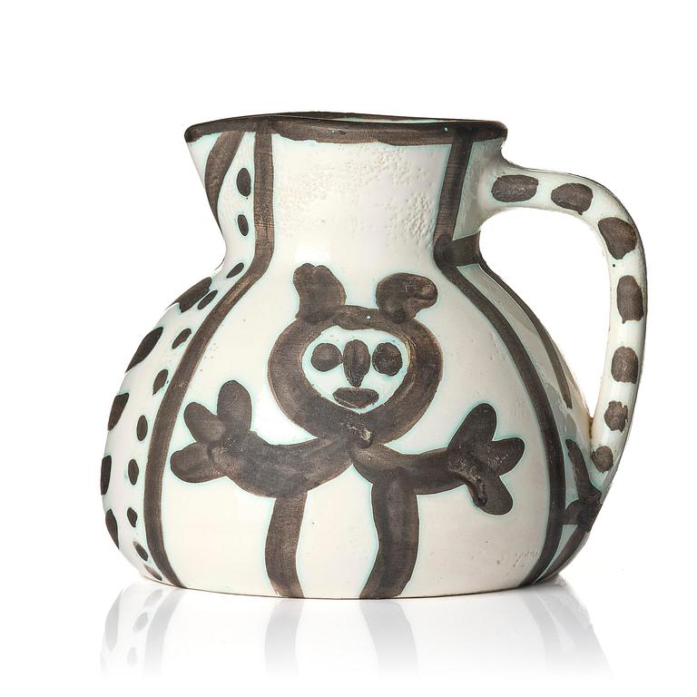 Pablo Picasso, a "Pichet petites têtes" (A.R. 222) faience pitcher, Madoura, Vallauris, France, post 1953.