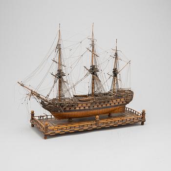 A 18th Century wooden ship model.