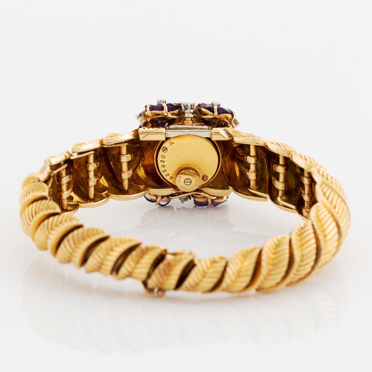 Gübelin armband/armbandsur 18K guld med ametister och runda briljantslipade diamanter.
