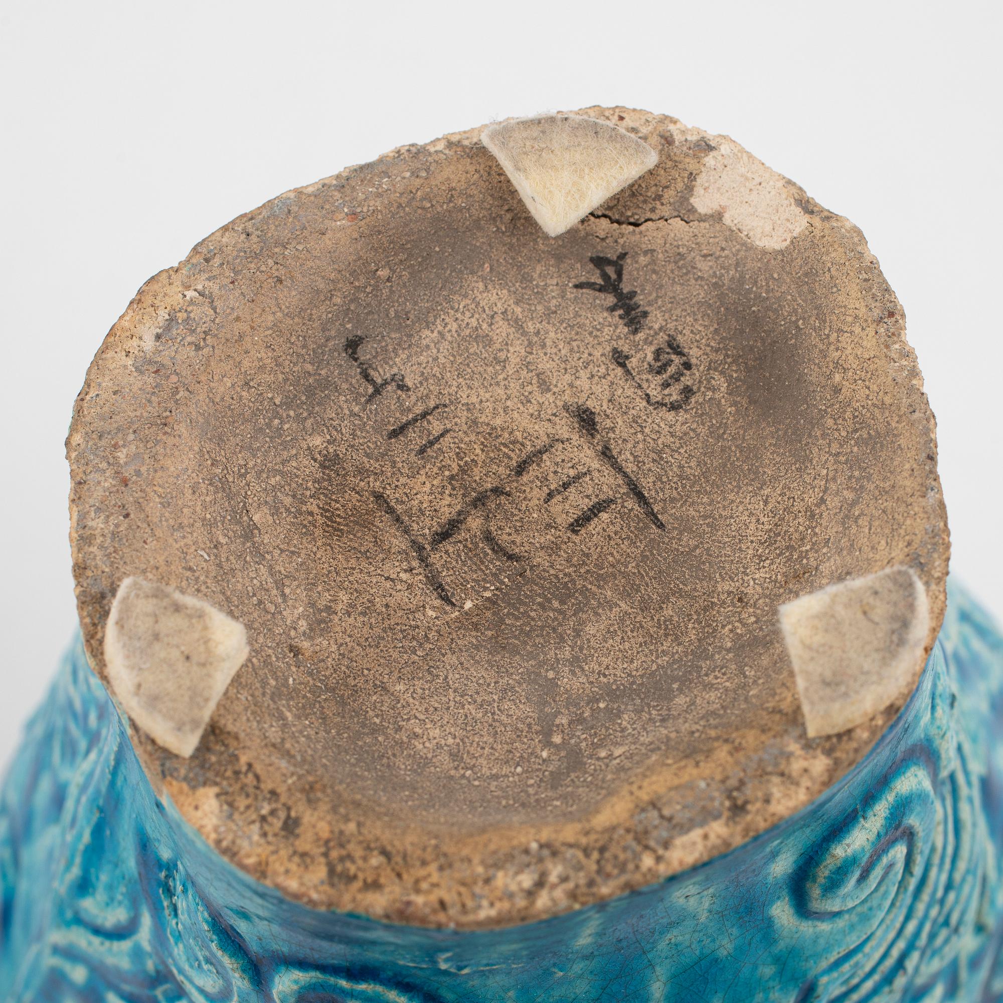 A pair of earthenware vases, late Ming dynasty (1368-1644).