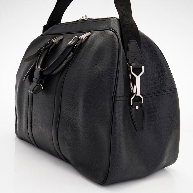 Louis Vuitton, a 'Taiga Kendall PM' weekend bag.