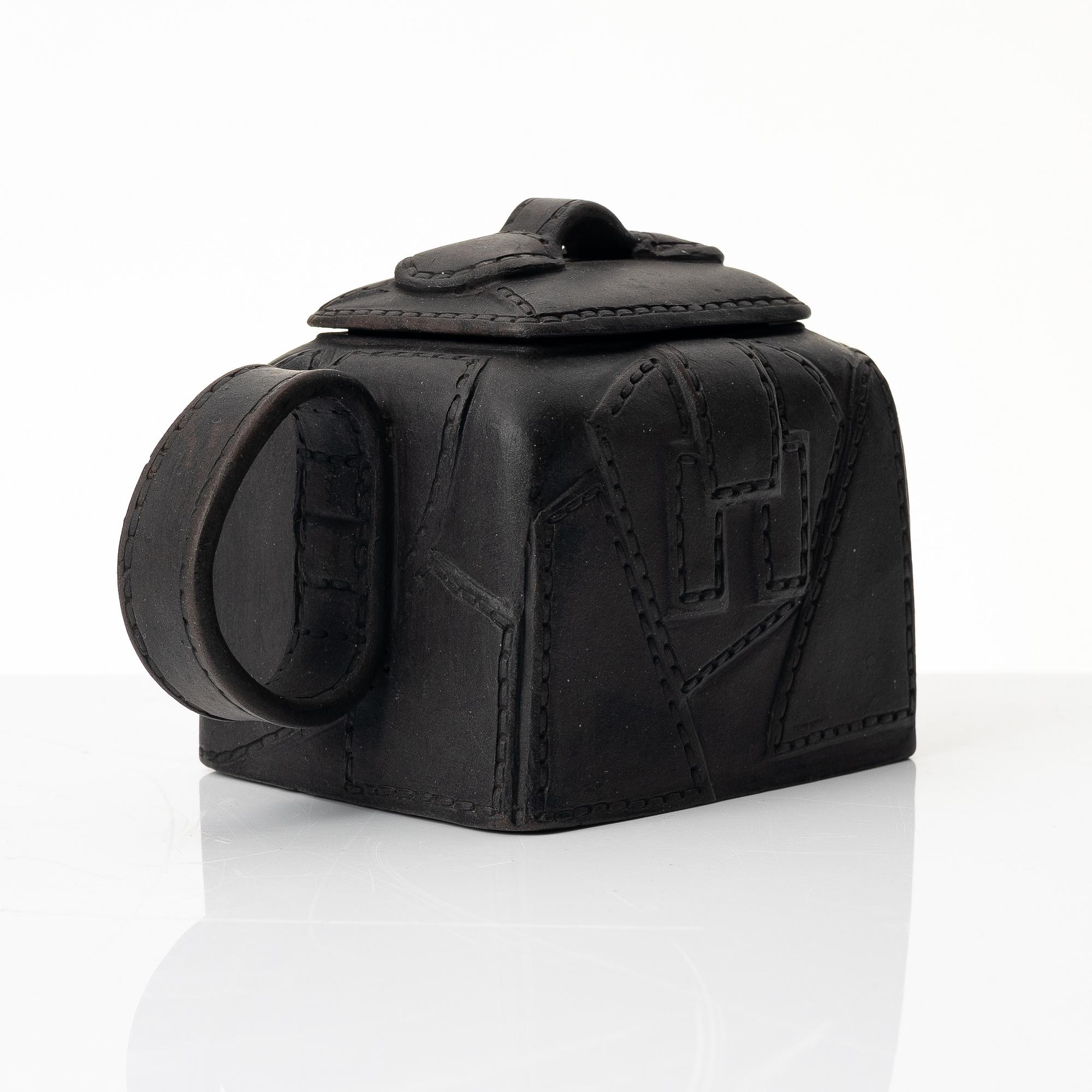 Zhou Guizhen, A Chinese 'leather bag' teapot, yixing, 1980s.