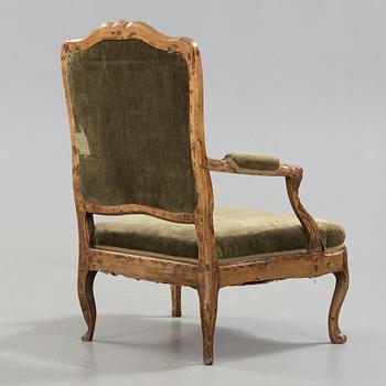 A Rococo 18th century armchair.