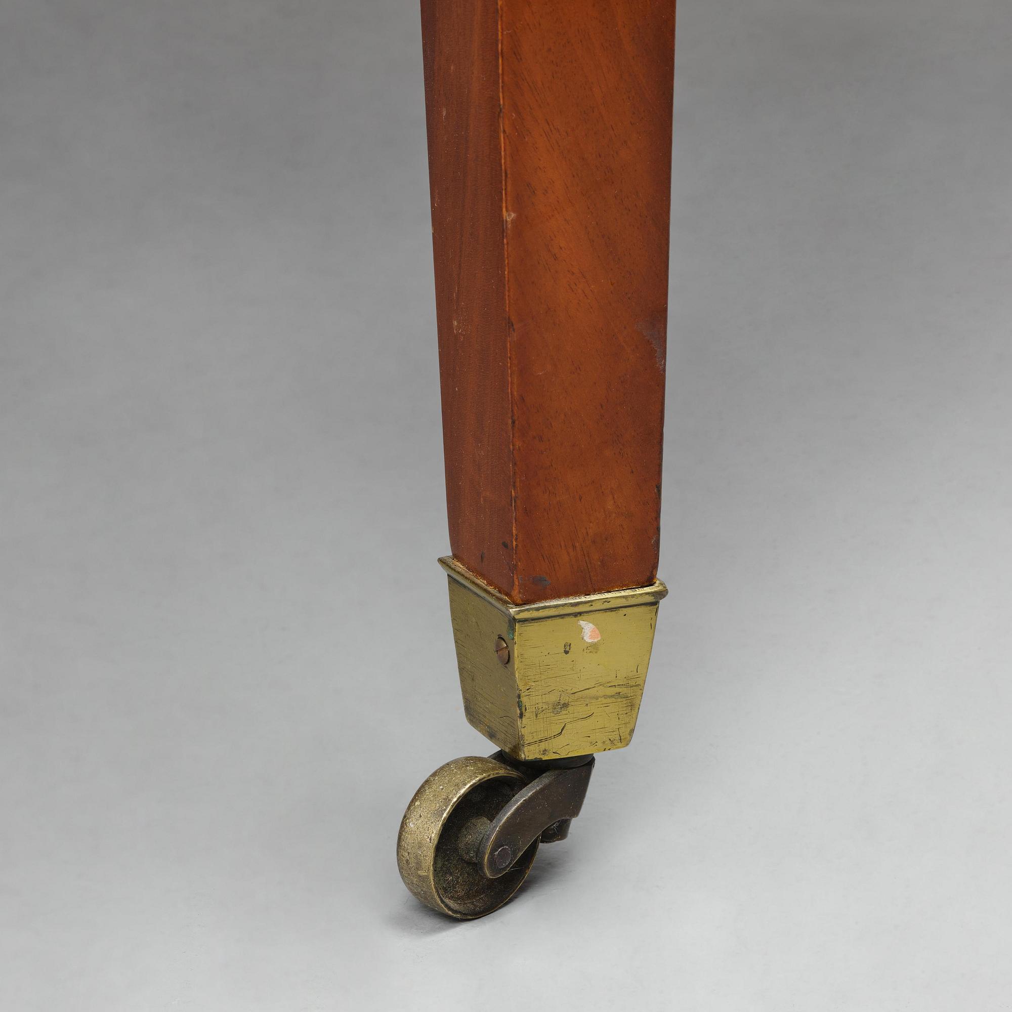 A George III mahogany D-end dining table, circa 1800.