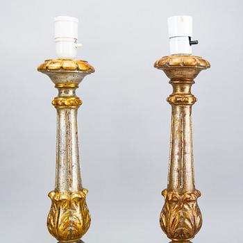 Four mid 20th century wood table lamps from Paoletti, Firenze Italy.