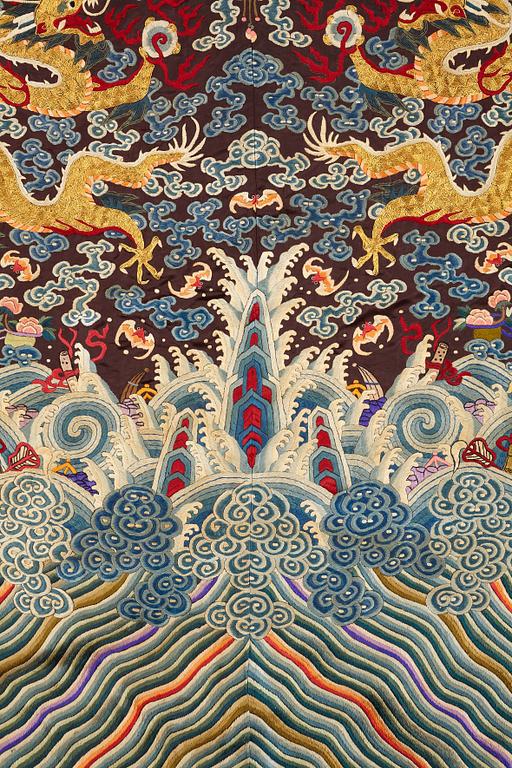 A Chinese embroidered silk robe, late Qing dynasty, circa 1900.