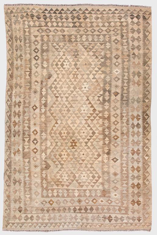 A Kilim carpet, ca. 305 x 196 cm.