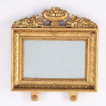 A pair of Swedish Empire mirror wall sconces, first half of the 19th century.