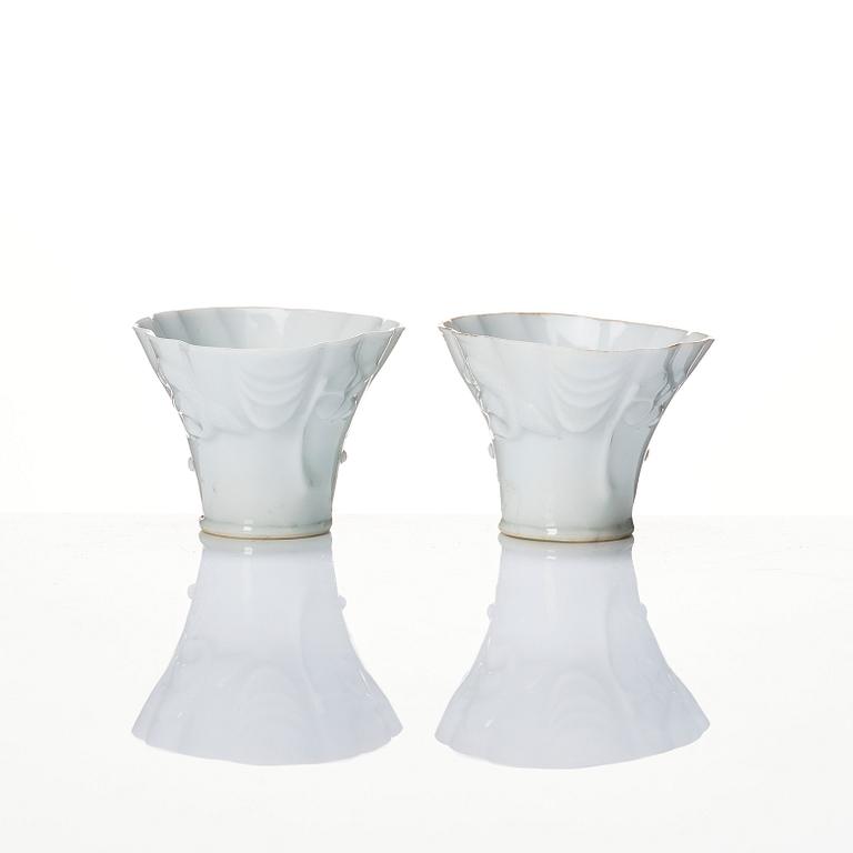 A pair of blanc de chine libation cups, Qing dynasty, 19th Century.