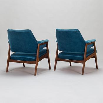 A pair of mid 20th century armchairs.