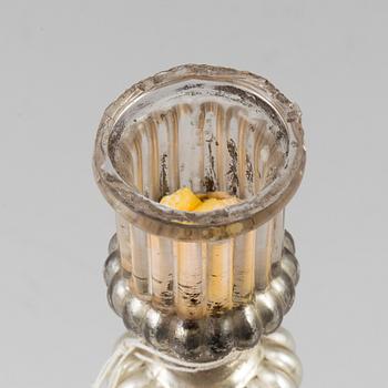 A 19th century glass candlestick.