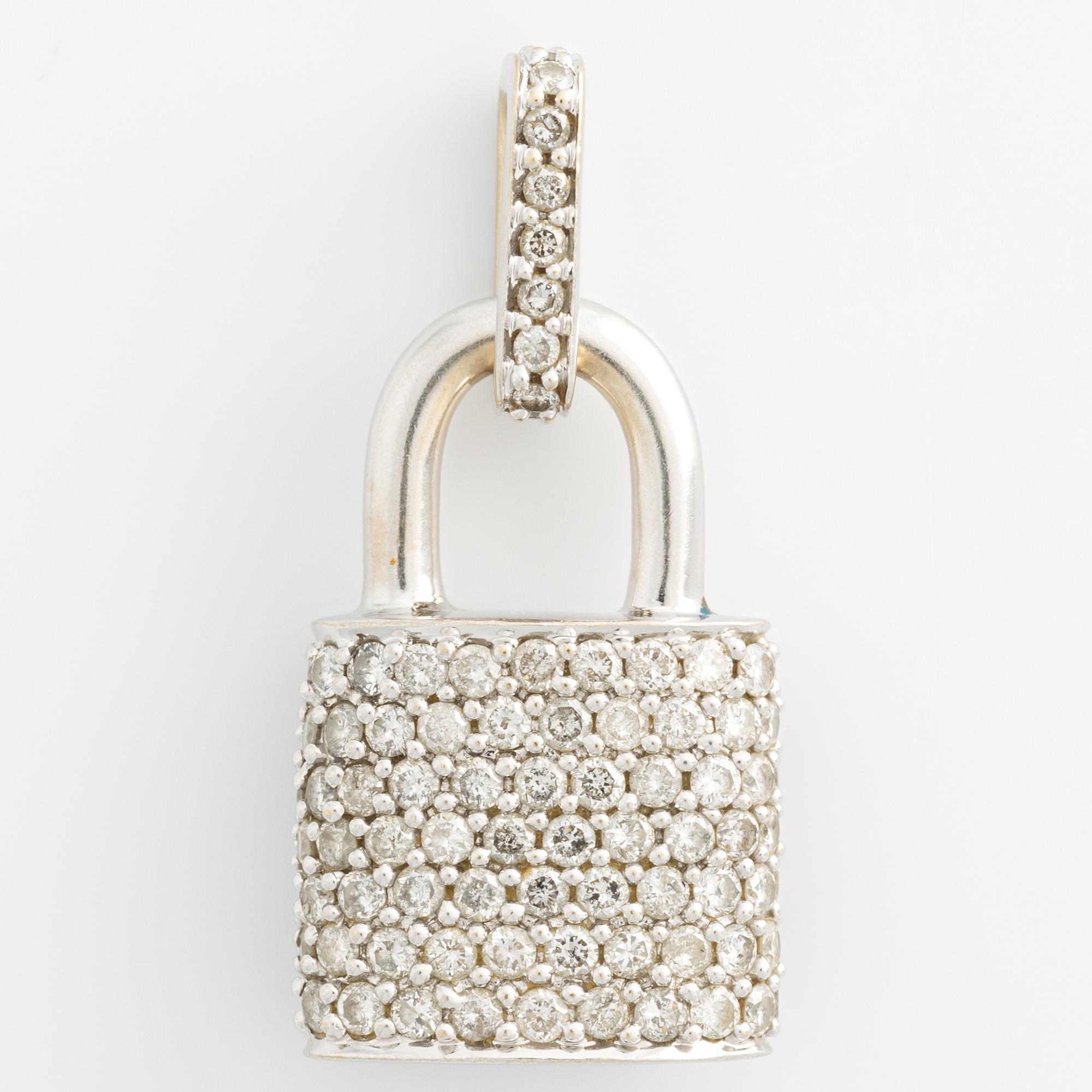 Hängsmycke i form av lås 18K vitguld med runda briljantslipade diamanter.
