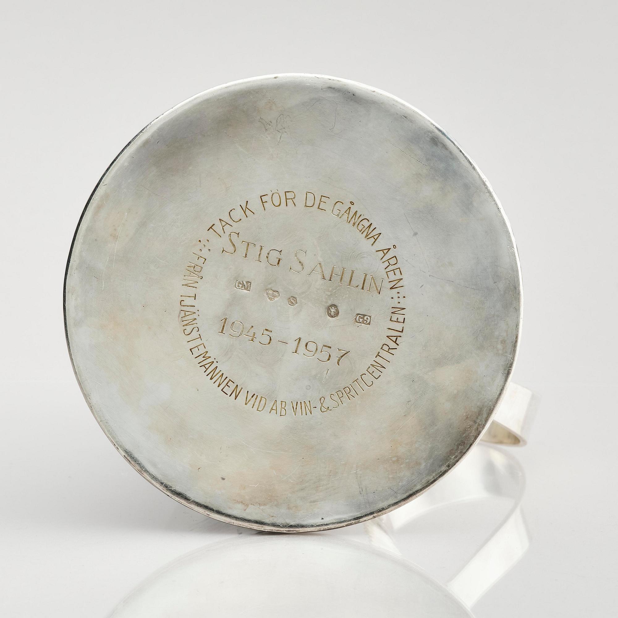 G H Markenius, a silver pitcher with handle, Stockholm 1957.