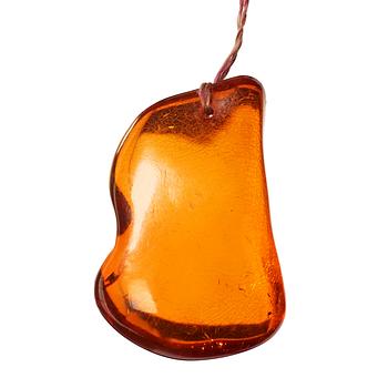 A polished piece of amber, Qing dynasty (1644-1912).