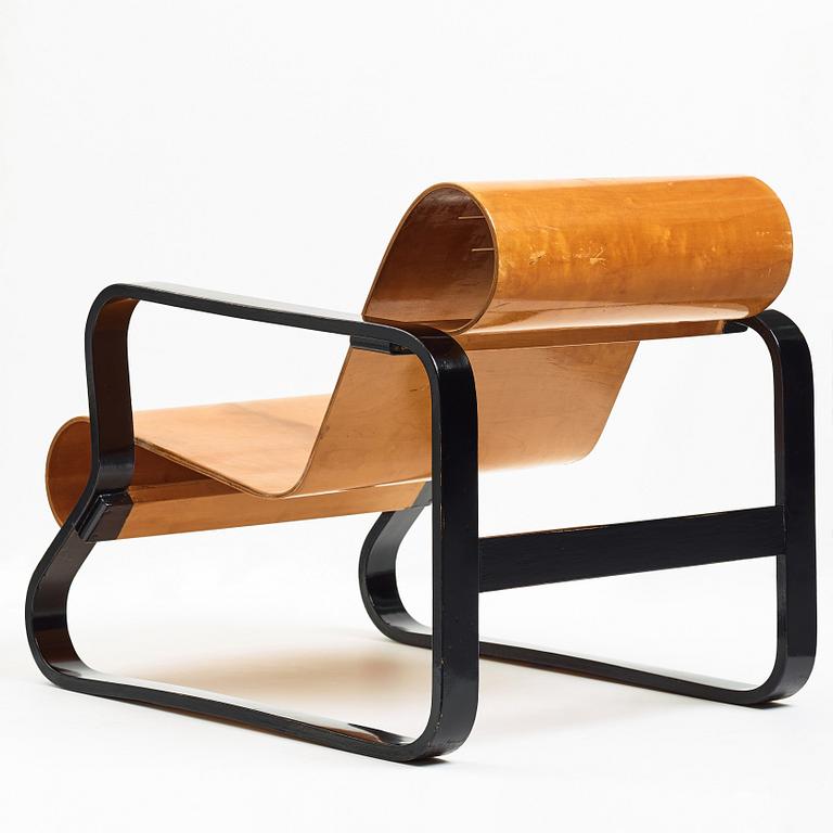 Alvar Aalto, a partly black lacquered birch "Paimio" chair by  O.y Huonekalu-ja Rakennustyötehdas A.B for Artek, Finland 1930-40's.