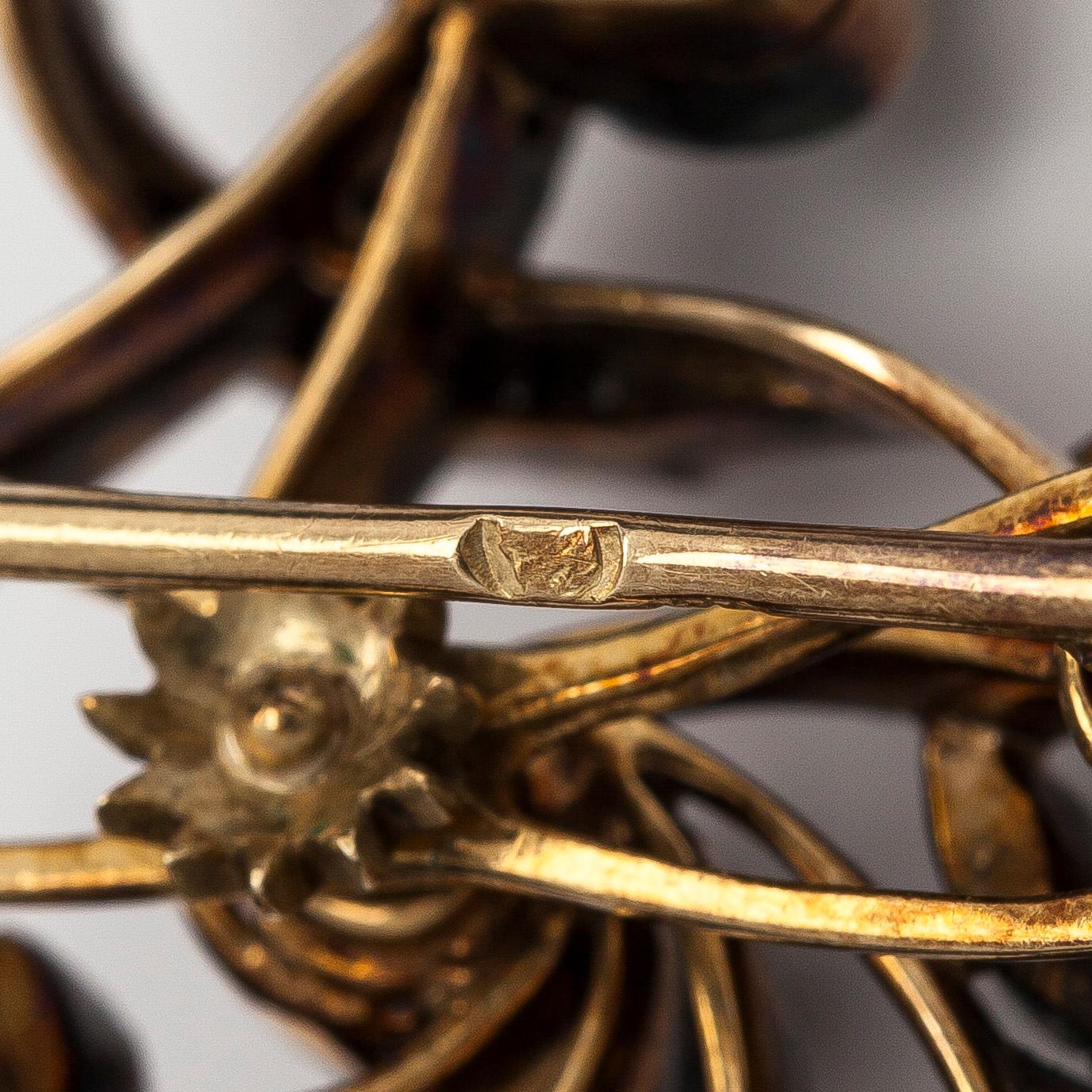 Brosch/hänge, silver och guld med gammalslipade och rosenslipade diamanter.