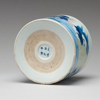 An underglaze blue, copper-red and celadon-glazed brushpot, Qing dynasty, early 18th Century, with Chenghuas mark.