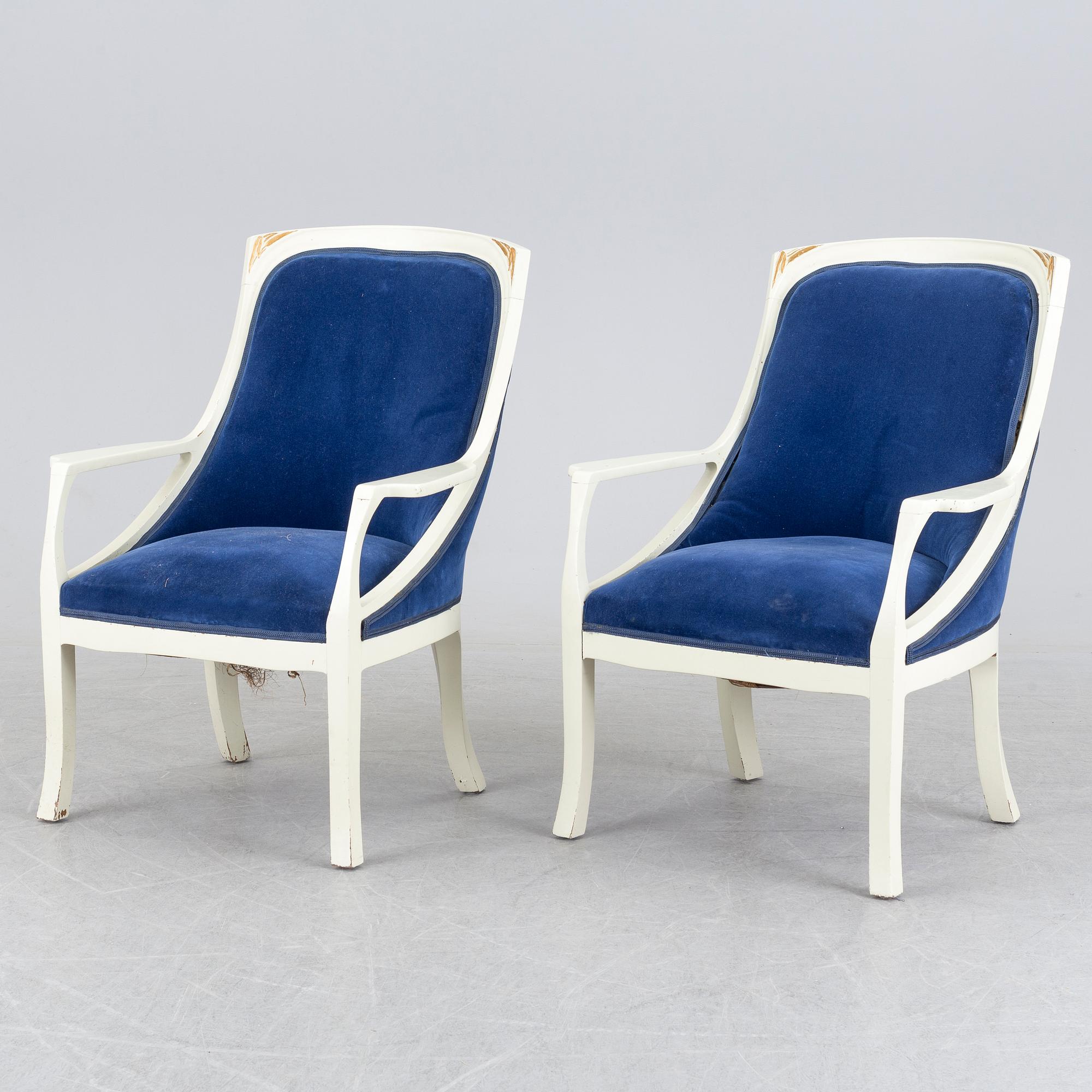 A pair of art nouveau armchairs.