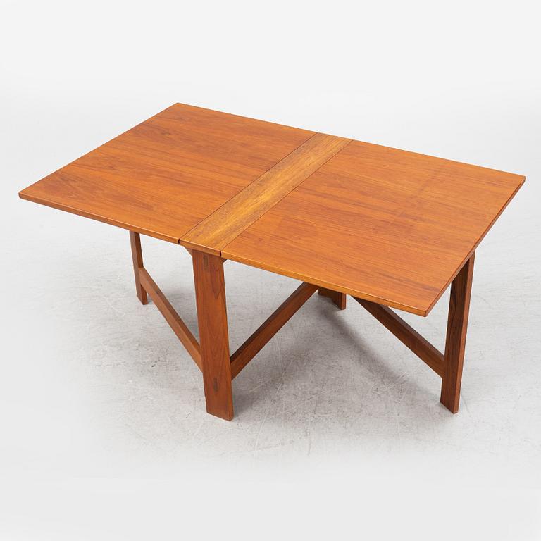 A teak gateleg table second part of the 20th Century.