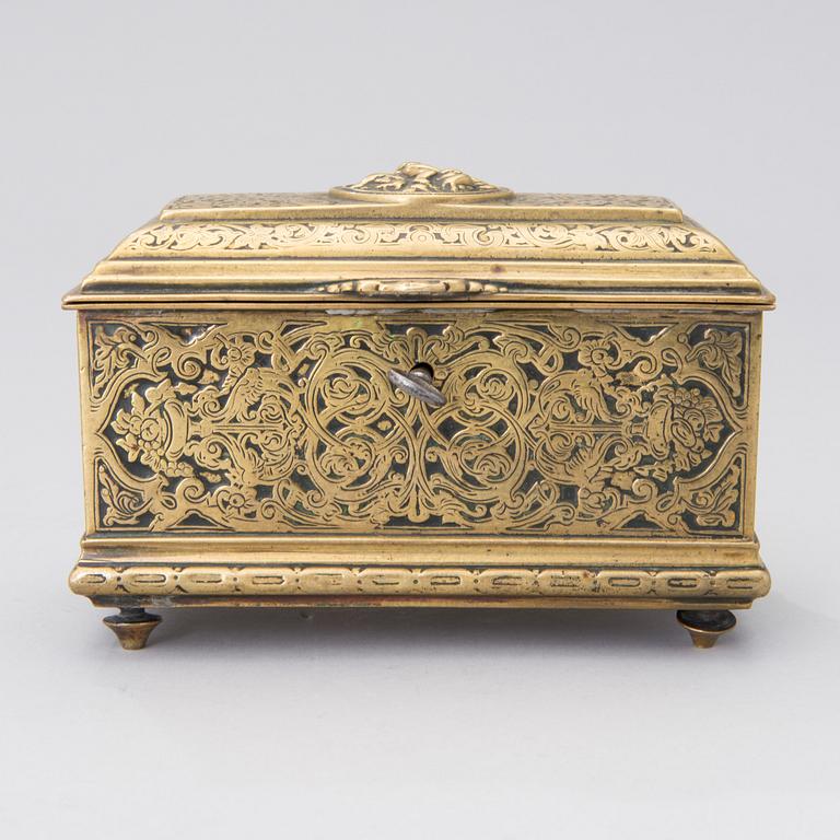 A Renaissance style brass box, Adolf Frankau & Co, London, from the late 19th century.
