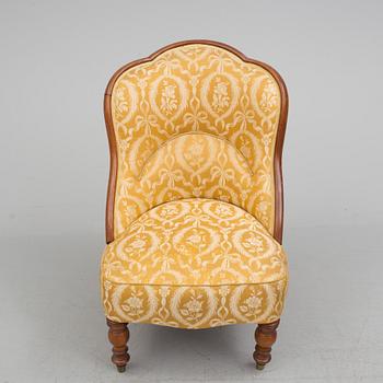 A late 19th century easy chair.