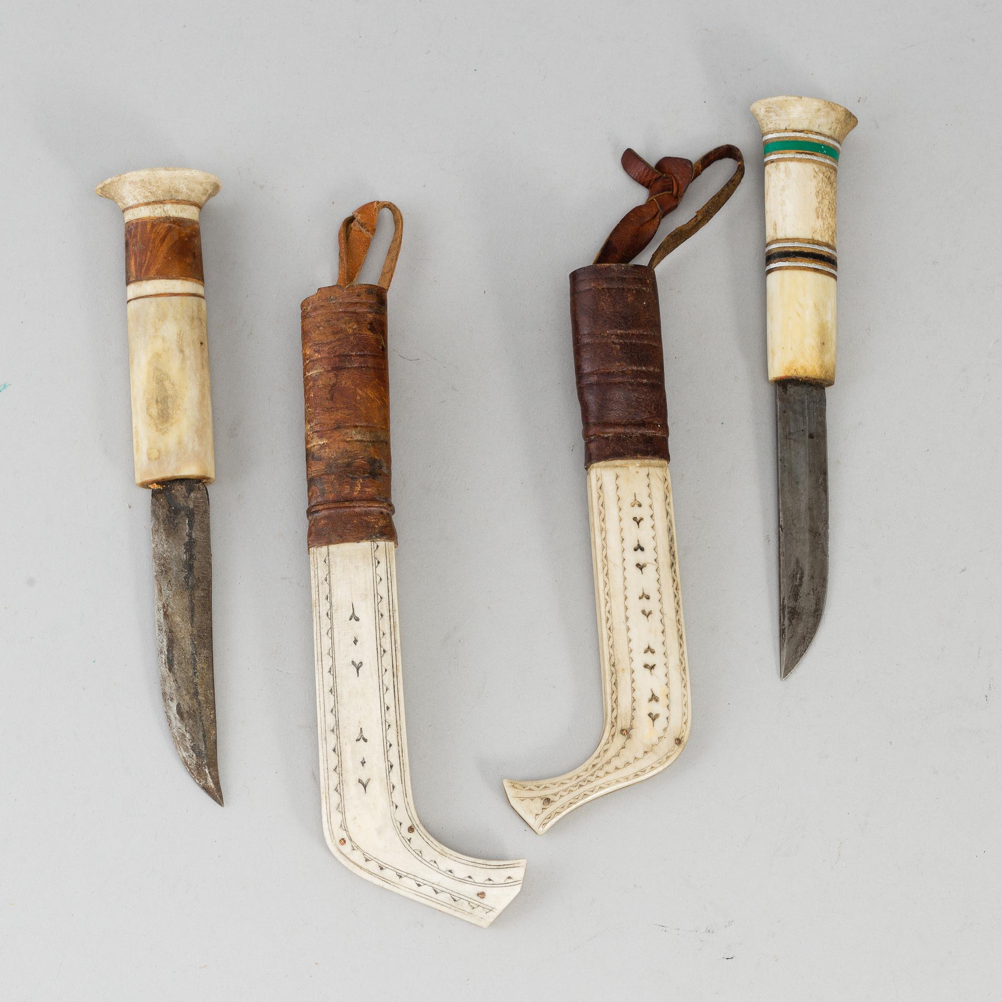ERIK TUOLJA, two Sami reindeer horn knives, signed ET.