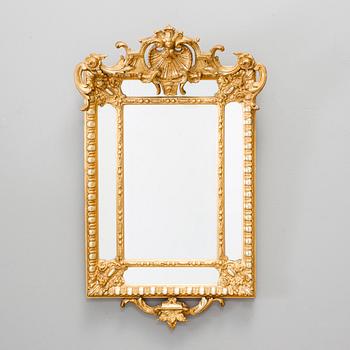 A late 19th century gilt mirror.