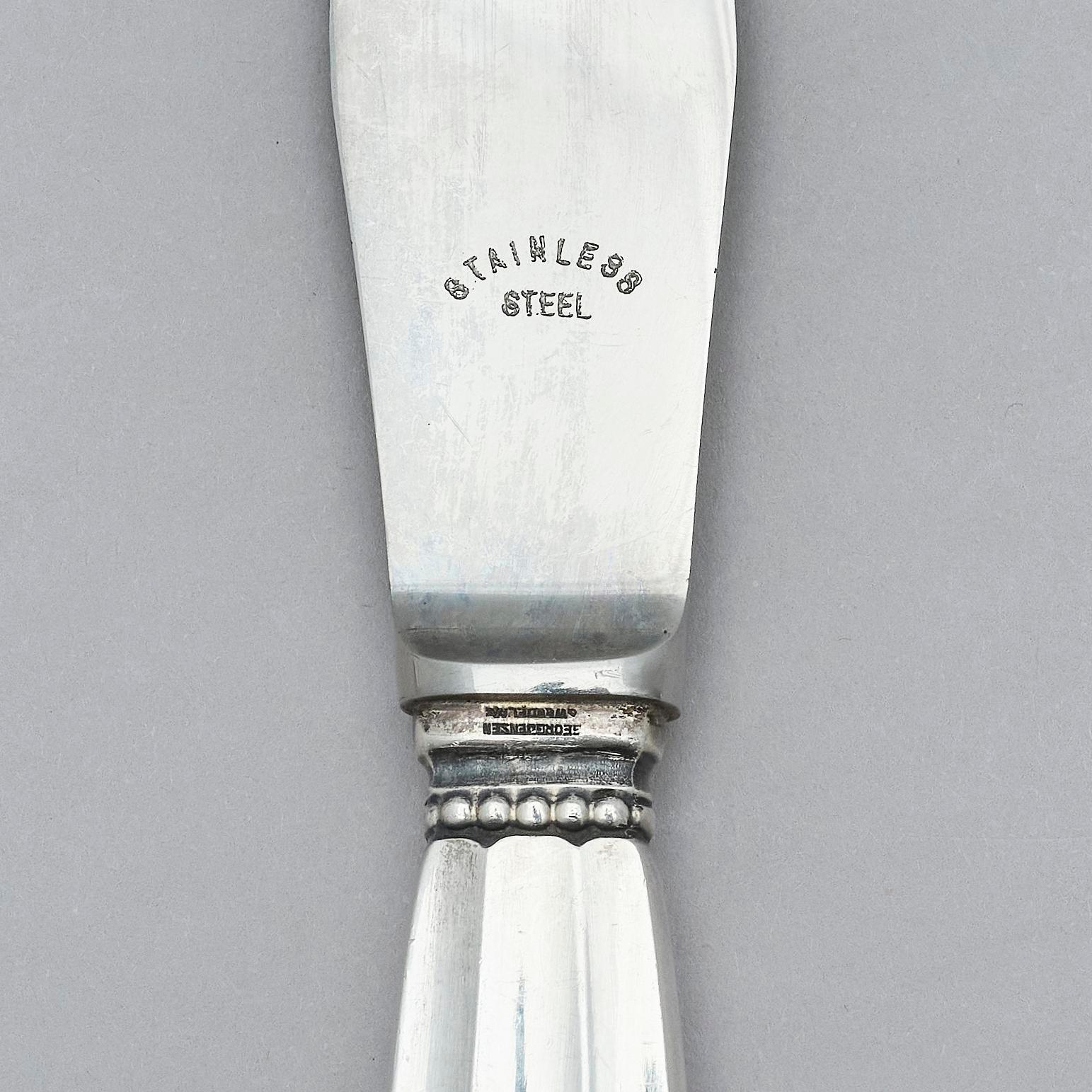 Georg Jensen, a set of 139 pieces of  'Acorn' sterling silver and stainless steel flatware, design Johan Rohde, Copenhagen after 1945.
