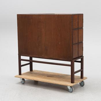 A Swedish Modern cabinet, 1930s-40s.