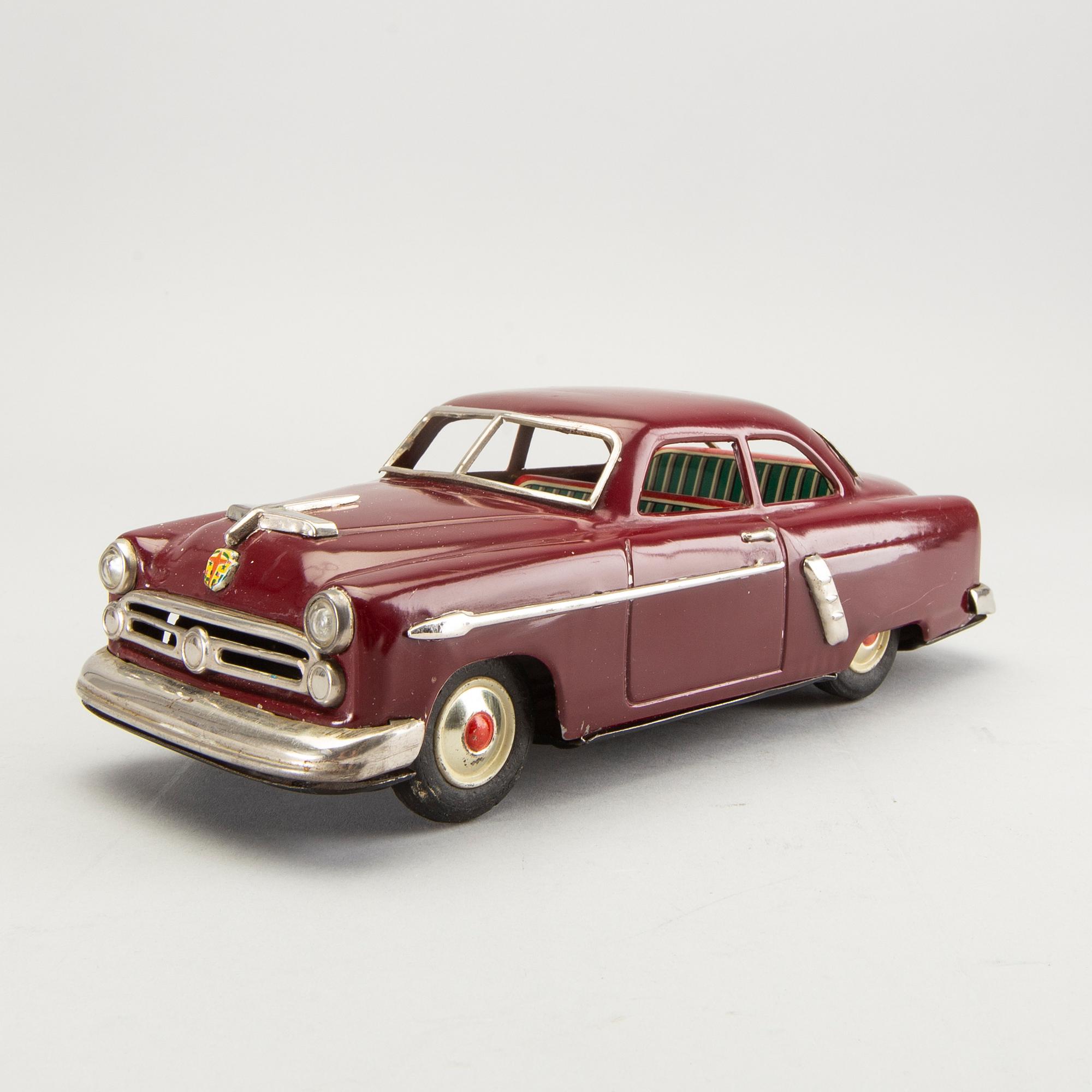 A Ford toy car Marusan Toys Japan mid 1900s.