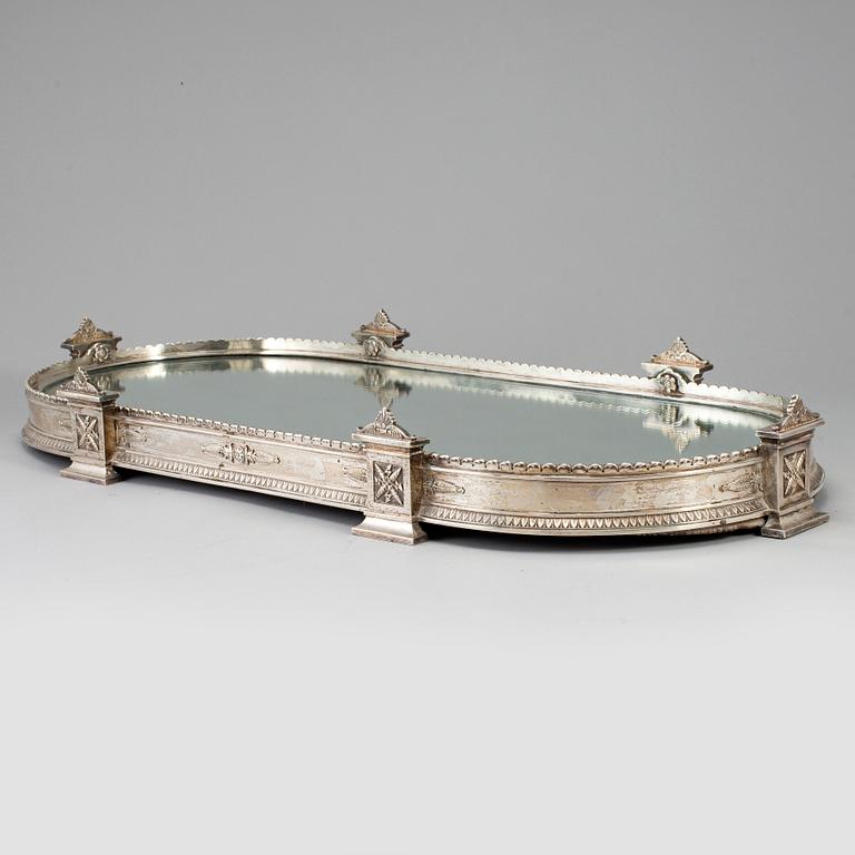 An Austrian-Hungarian early 20th century silver table-mirror. Empire-style.