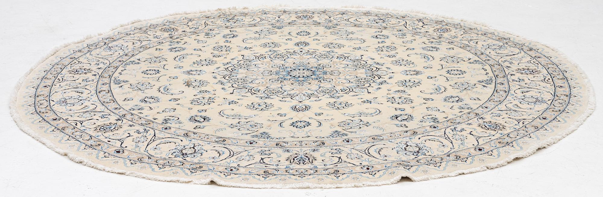 A Nain rug, diameter a. 247 cm.