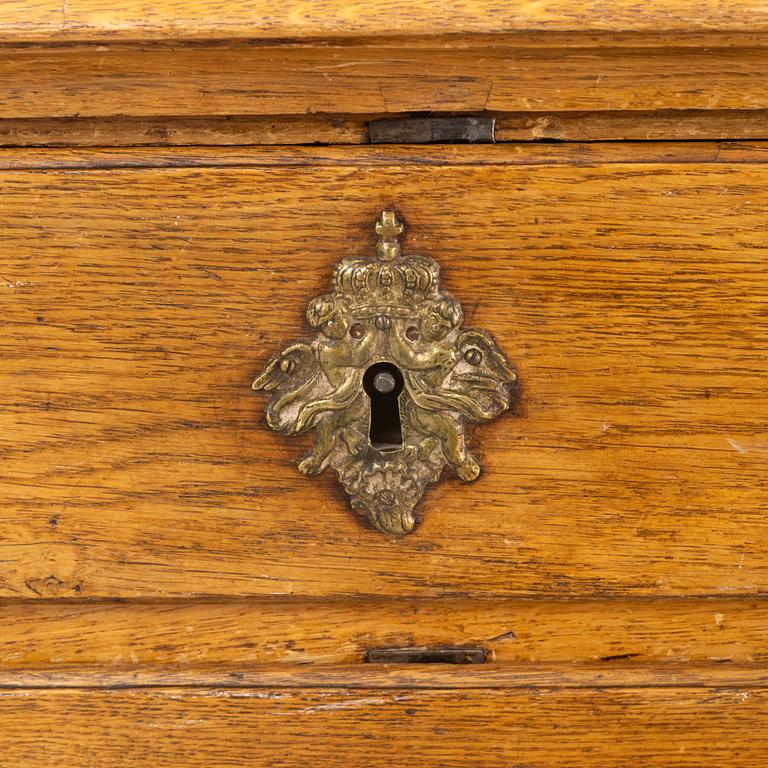 A Rococo cabinet, later part of the 18th Century.