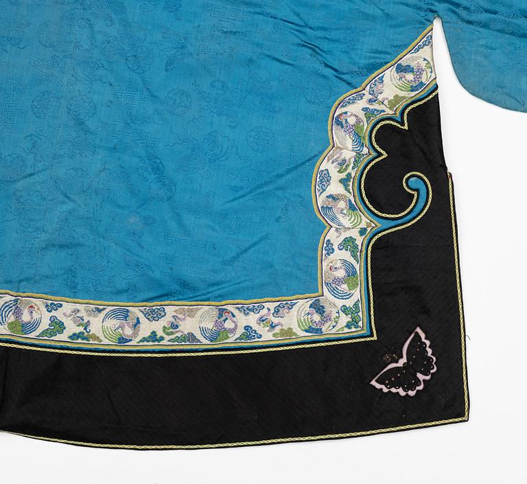 A female silk robe/over coat for winter, Qing dynasty, 19th century.