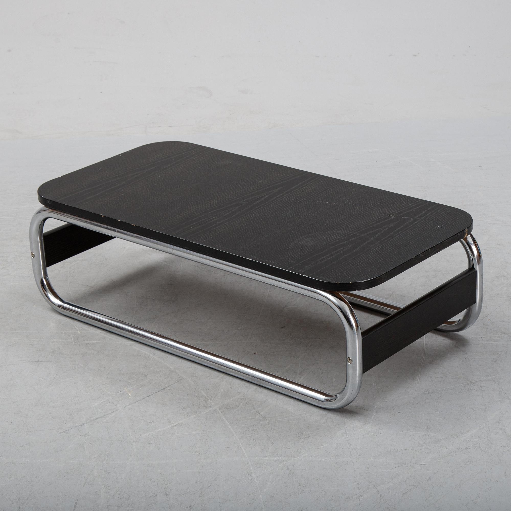 A pair of 'Impala' lounge chairs with table by Gillis Lundgren for IKEA, released 1972.