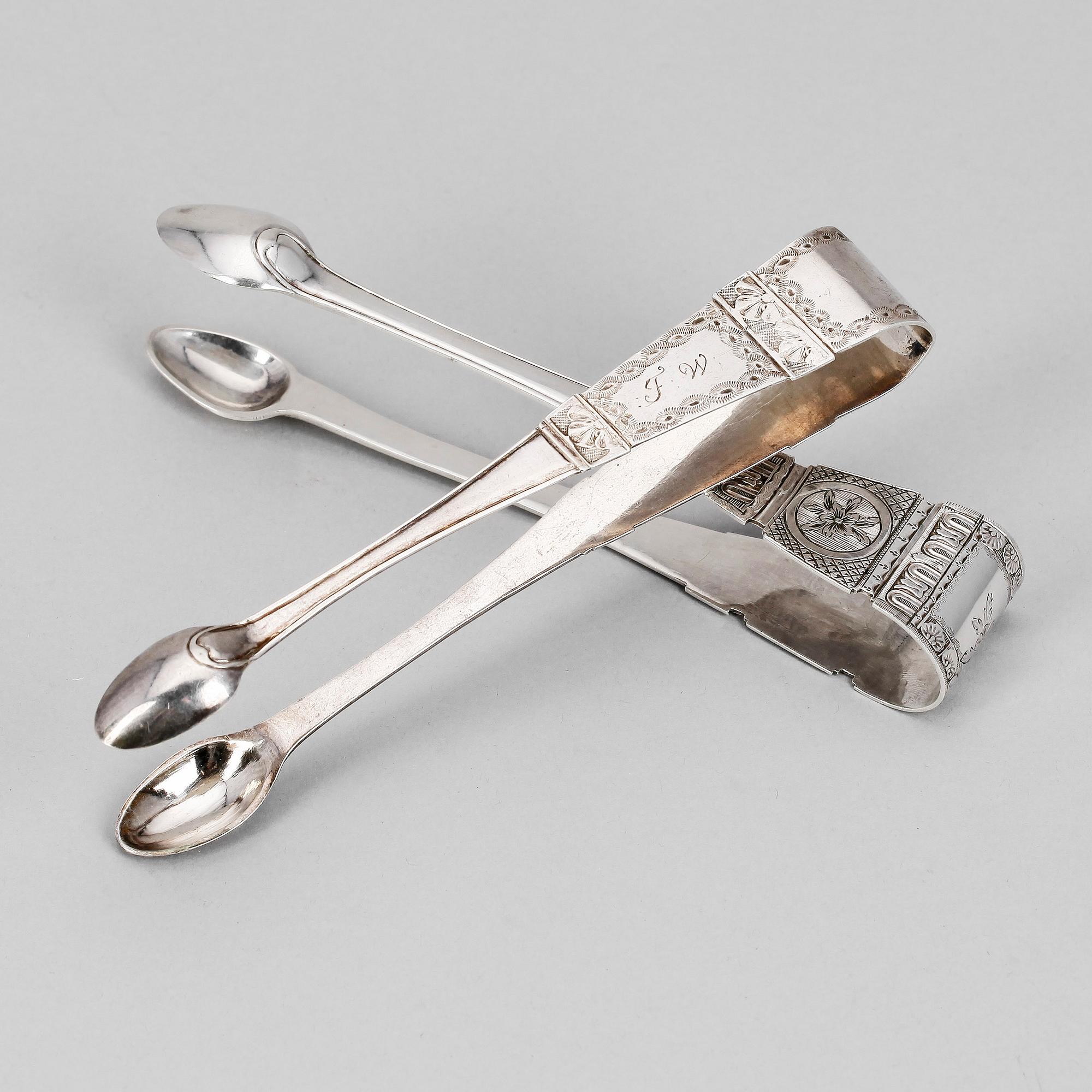 SOCKERTÄNGER, 2 st, silver, bland annat Daniel Lundström, 1783, Stockholm. Vikt 75g.