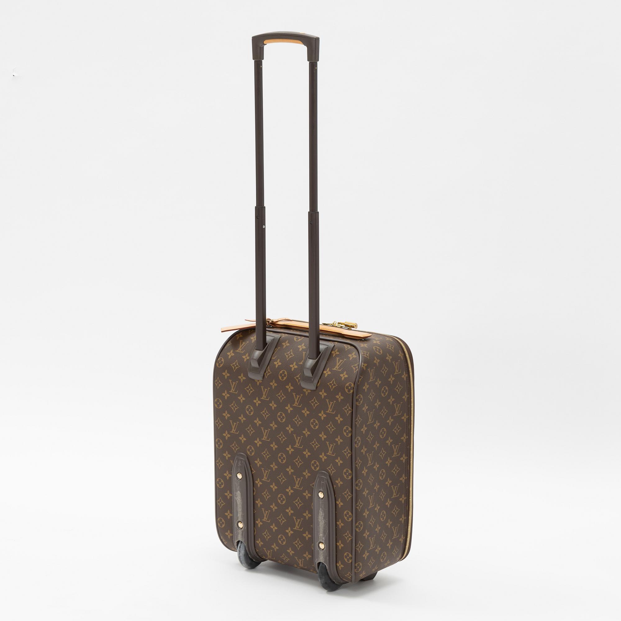 Louis Vuitton, a monogram canvas 'Pégase 50' suitcase, 203.