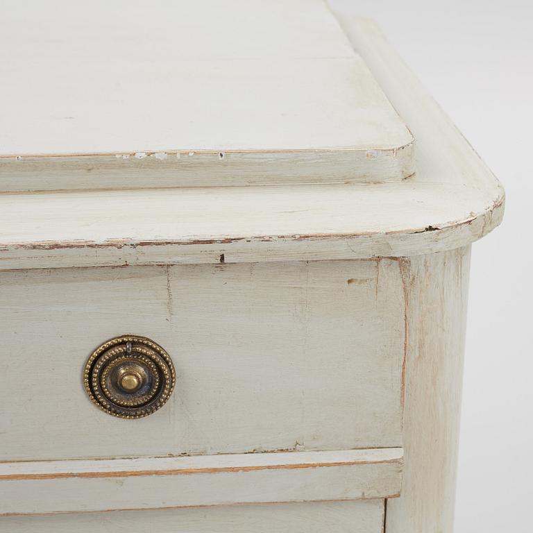 A chest of drawers, circa 1900.