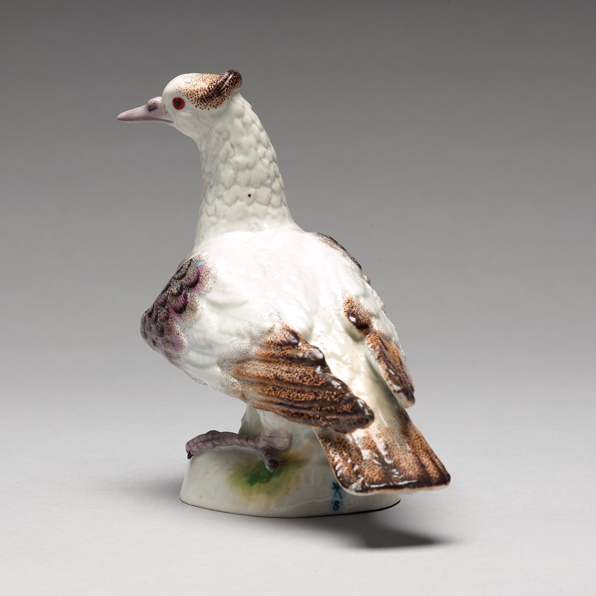 A porcelain figure of a dove, possibly Samson.