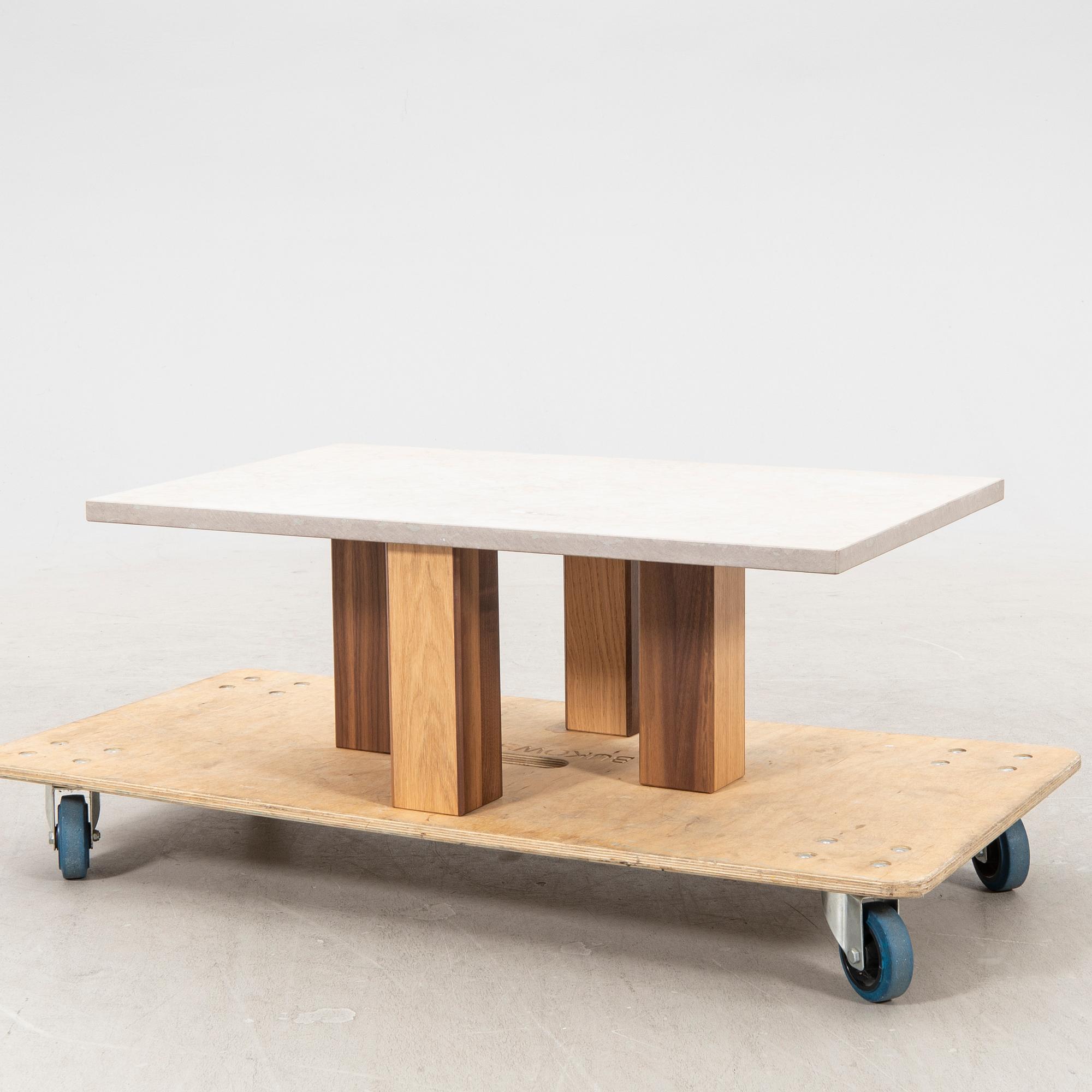 A 21st century limestone coffee table.