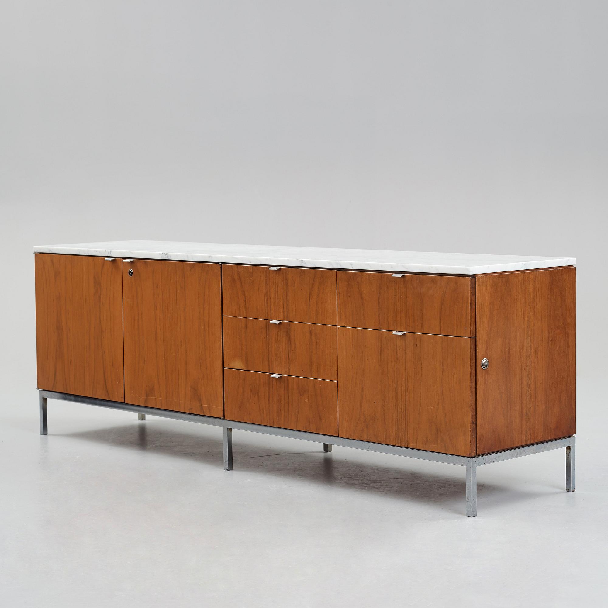 Florence Knoll, a walnut and white marble top sideboard, probably produced on license by Nordiska Kompaniet, Sweden 1960's.