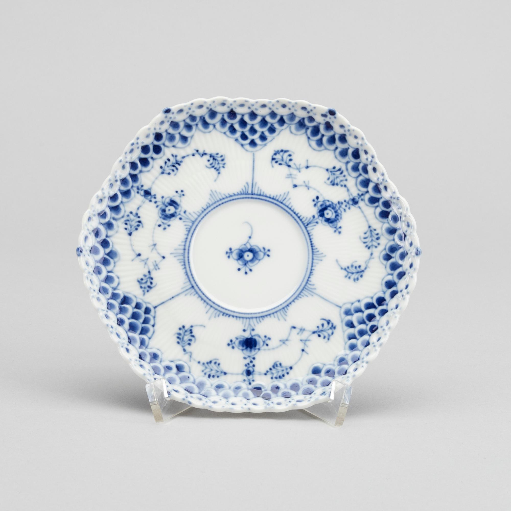 A set of 17 porcelain chocolat cups and saucers Musselmalet Royal Copenhagen Denmark.