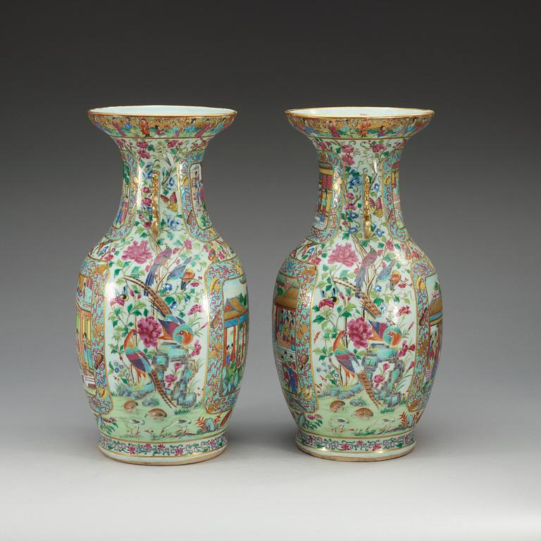 A pair of famille rose Canton vases, Qing dynasty, 19th Century.